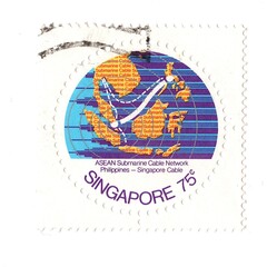 A vintage postage stamp from Singapore isolated on a white background.