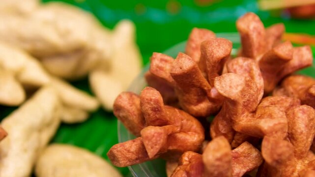 Crunchy snacks variety Malaysian Indian deep fried crispy and crunchy snacks in plastic packages and bottles for sale at Bentong Murukku shop,Ipoh.