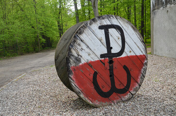 Gierłoż  may 2,2025  the Polish fighting sign on a white and red background in the Wolf's Lair...