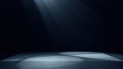 Spotlight illuminating a dark stage with interesting shadows and a textured floor creating a dramatic and atmospheric scene