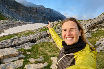 Selfie of a female mountaineer at sunset