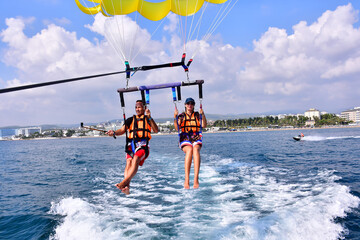parasaling over the sea. High quality photo
