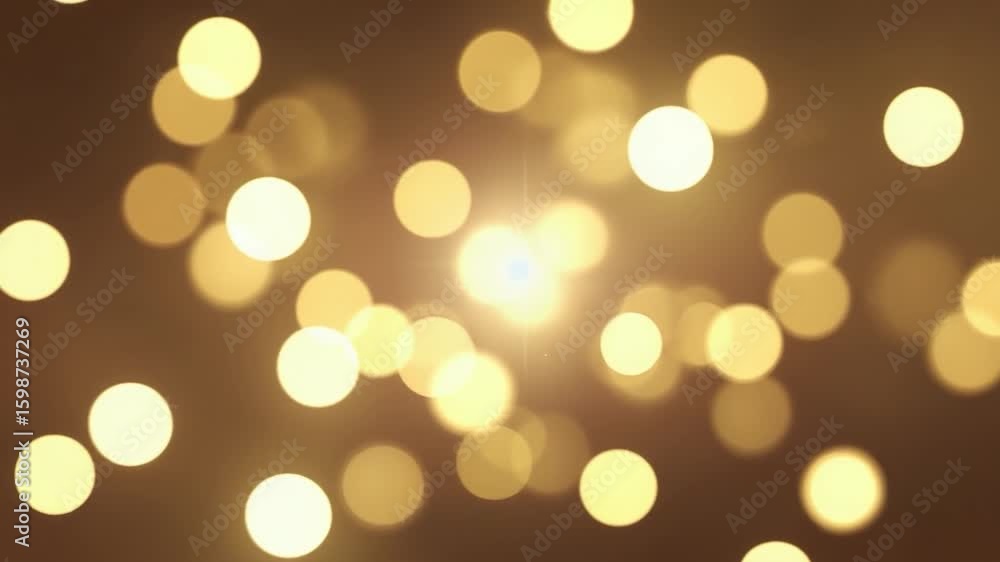Poster blurry image of a sun with a bunch of golden circles surrounding it. the circles are of different si