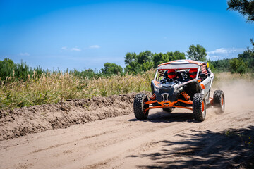 Outdoor activities UTV buggy on dusty track. 4x4, extreme, adrenalin
