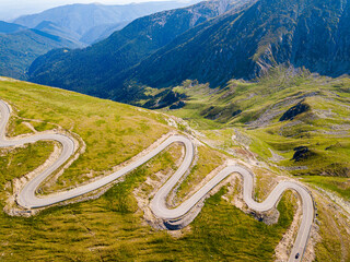 Aerial view of the spectacular Transalpina road with many serpentines crossing the Carpathian mountains at high altitude