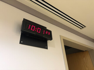 A Digital Wall Clock in Hospital Room or Maternity Ward