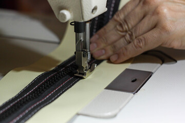 woman working on a sewing machine