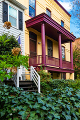 colorful townhouses and trees in washington spring
Warm colors and spring foliage highlight the character of a historic D.C. neighborhood.