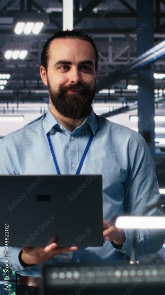 Poster vertical video portrait of smiling engineers in data center code with generative ai assistance. happ