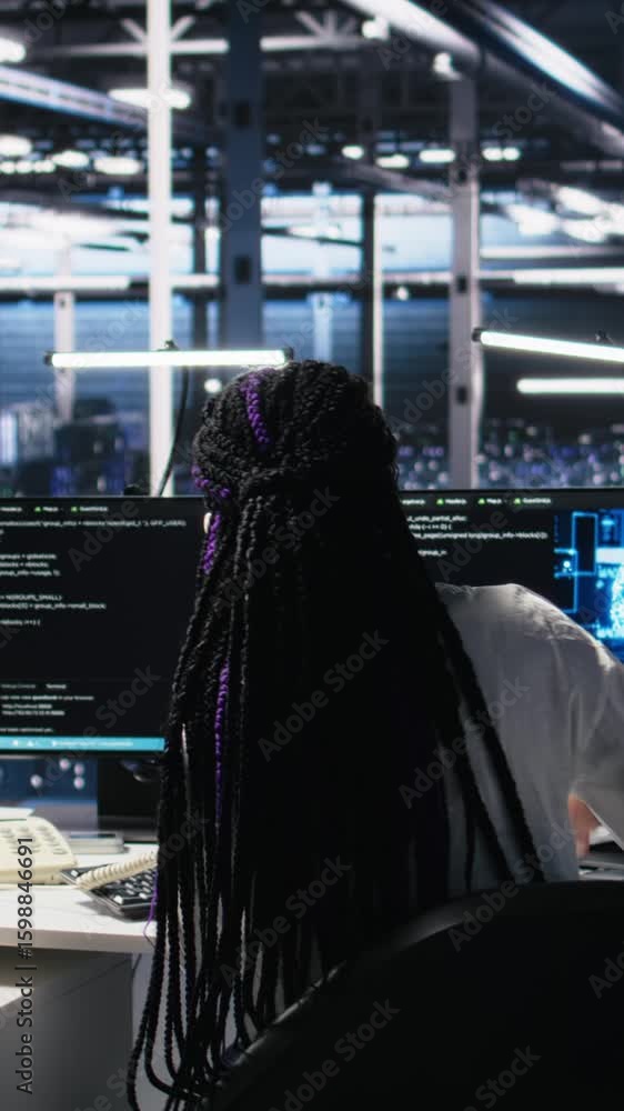 Poster vertical video engineer in data center answers telephone call, assisting users with ai troubleshooti