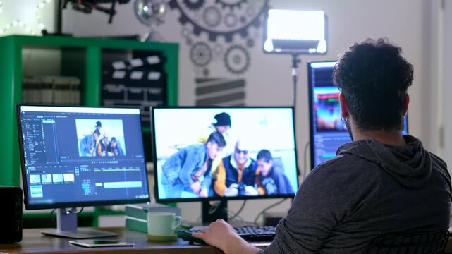 Male Video Editor Working in Professional Post-Production Studio