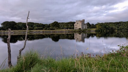 Scenic View of Tranquil Heritage Landmark Menlo Castle by the River Corrib with Peaceful Water Reflection in Galway, Ireland, buildings and architecture background