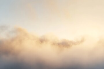 Obraz premium Warm Cloudscape at Sunrise with Soft Colors Creating an Ethereal Feeling