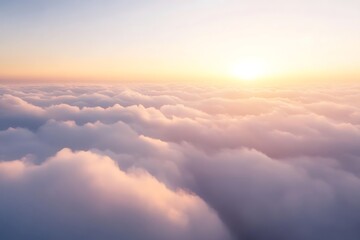 Aerial View of Clouds at Sunset with Warm Sunlight Above the Skies