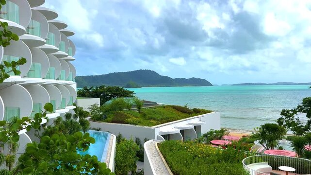 Beautiful view from Kao Khad next to Cape Panwa on the island of Phuket Thailand. Views of the turquoise Blue waters of the Andaman Sea and small islands off the coat of Phuket