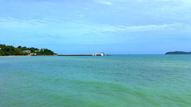 Beautiful view from Kao Khad next to Cape Panwa on the island of Phuket Thailand. Views of the turquoise Blue waters of the Andaman Sea and small islands off the coat of Phuket
