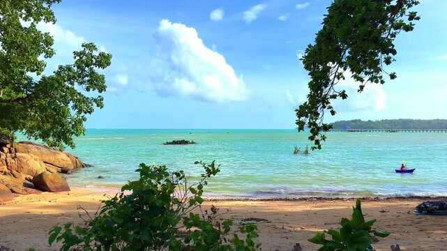 Beautiful view from Kao Khad next to Cape Panwa on the island of Phuket Thailand. Views of the turquoise Blue waters of the Andaman Sea and small islands off the coat of Phuket