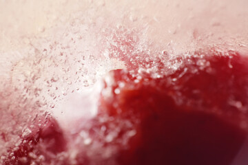 Fototapeta premium Macro texture of bubbles on ice block