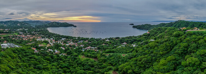 Beautiful  aerial view of Playas del Coco, Costa Rica — golden beaches, lush hills, and a scenic bay filled with yachts, perfect for tourism, ocean adventures, and tropical getaways