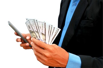 close up photo of businessman's hand holding dollar bill and mobile phone