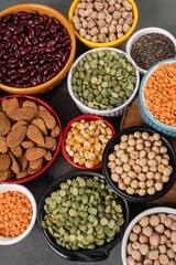 several pots with raw grains for preparing healthy food