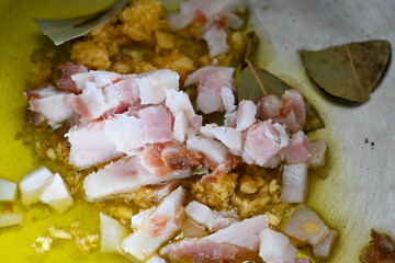 Pan with seasoning to prepare beans