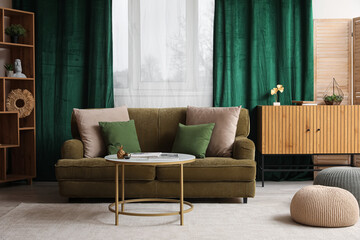 Stylish interior of living room with sofa and table