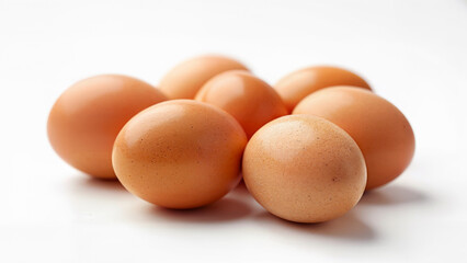 A group of brown chicken eggs isolated on white background. Suitable for food, nutrition, cooking, and healthy eating concepts in digital or print media.