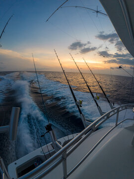 Sport fishing adventure off the coast of Costa Rica &mdash; aerials and onboard shots of yachts, deep sea fishing rods, and anglers in action under dramatic ocean skies