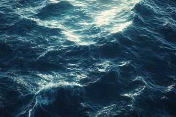 Fototapeta premium Ocean Waves Rolling with Sunlight Glare Over Dark Blue Water Surface