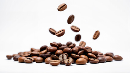 Obraz premium Brown roasted coffee beans falling onto a pile, isolated on a clean white background. Suitable for illustrating coffee, food, beverage, or cafe concepts in advertising and design projects.