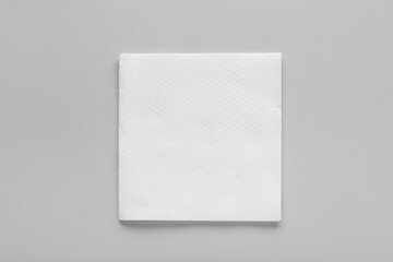 Paper napkin on grey background