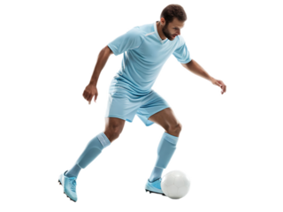 Male soccer player in light blue uniform dribbling a soccer ball on a black background isolated shot