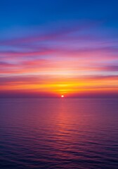 Fototapeta premium Vibrant Sunset Over Calm Ocean