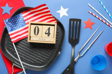 USA flag, calendar with date 04 JULY and barbecue utensils on blue background. Independence Day...