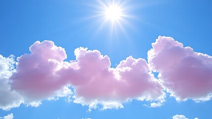 Pastel pink cumulus clouds against a vibrant blue sky.