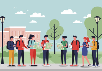 A group of students outdoors, consulting maps near a campus building.