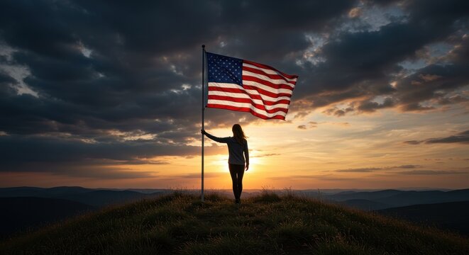 Person holding american flag sunset hilltop
