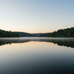 Fototapeta premium Serene Lake at Dawn with Misty Reflections