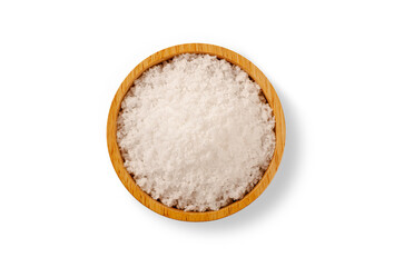 Top view of sea salt in wooden bowl on white background