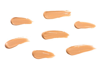Makeup foundation texture swatch. BB cream, concealer, paint smear isolated on white background.