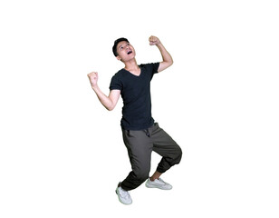 A Young Man is Very Happy Celebrating His Success with a Happy Expression and His Hands Raised Up While Yelling 'Yes', Concept of Victory and Achievement of Goals.