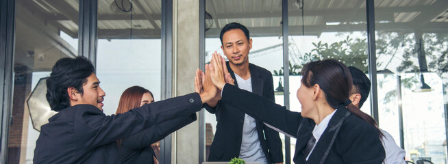 Banner Group of diversity people fist bump holding hands together power of tag team. Banner...