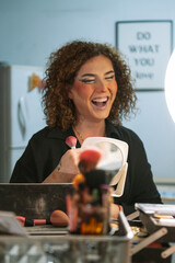 A drag queen putting on her makeup before going out to perform at a local theater in Peru.
