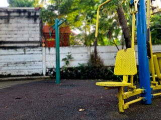 Yellow chest press machine for arm