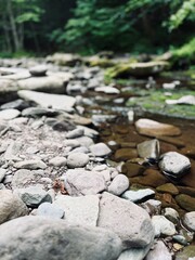 The scenic, stunning Kaaterskill Falls near North South Lake in Haines Falls, NY tucked away within the Catskill Mountains. Stunning waterfall view, rocks to climb and hike.  Explore nature outdoors.