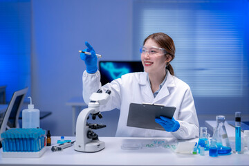 Scientist holding test tube and clipboard, explaining scientific results in laboratory