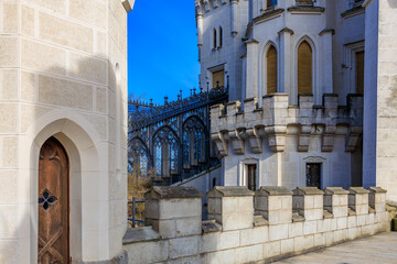 Gothic architecture of european castle with stone walls and arched windows