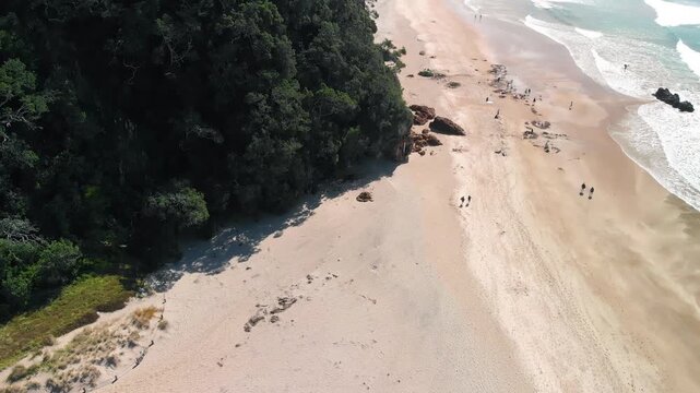 Bird&rsquo;s-eye perspective of Hot Water Beach, New Zealand, showcasing its natural beauty