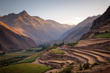 Breathtaking andes mountains with terraced fields at sunrise in sacred valley, peru